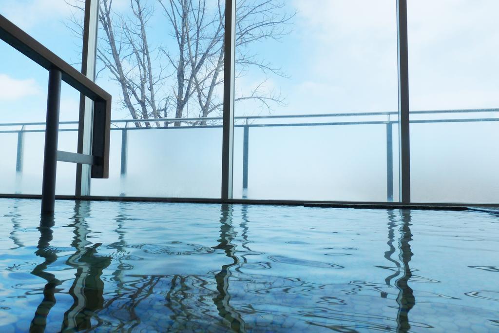 Shin Furano Prince Hotel Eksteriør billede A view of the indoor pool